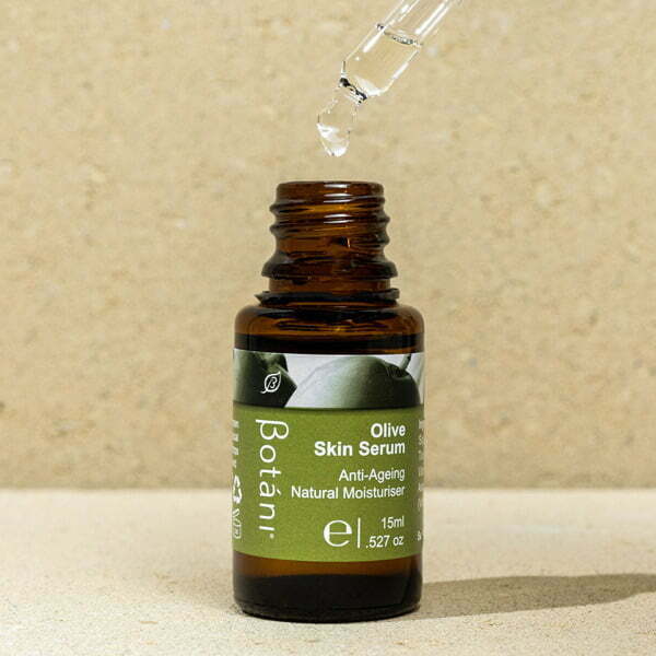 Bottle of Olive Skin serum with dropper 